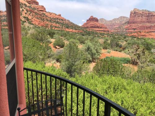 a balcony with a view of the canyon at The Penrose Bed & Breakfast in Sedona