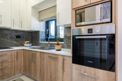 Η κουζίνα ή μικρή κουζίνα στο Villa Olive Green