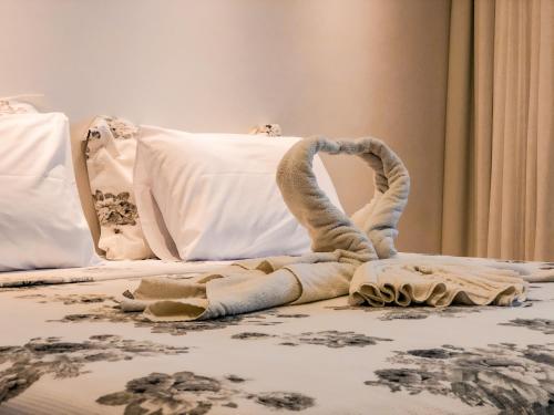 Una cama o camas en una habitación de Hotel Fazenda Triunfo