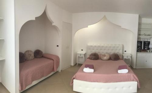 Ένα ή περισσότερα κρεβάτια σε δωμάτιο στο Casa il piccolo principe