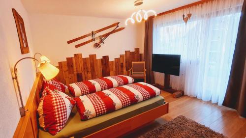 Postel nebo postele na pokoji v ubytování Lorli