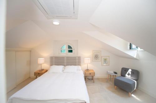 Katil atau katil-katil dalam bilik di Katareo Apartments