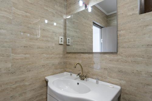 Koupelna v ubytování Toma Residence