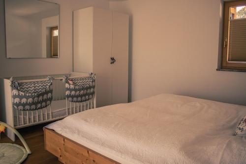 Ένα ή περισσότερα κρεβάτια σε δωμάτιο στο Ferienhaus Fanni