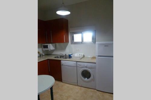 A kitchen or kitchenette at Alojamiento VuT Rupurupay B