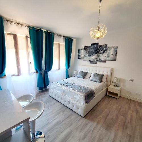 A bed or beds in a room at Villa Volta 3 Policlinico Monserrato