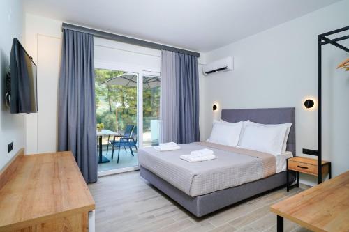Postel nebo postele na pokoji v ubytování Solar Suites