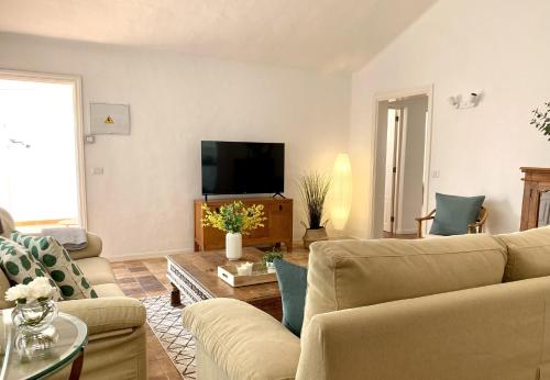 TV a/nebo společenská místnost v ubytování Apartamento Casa Cristina