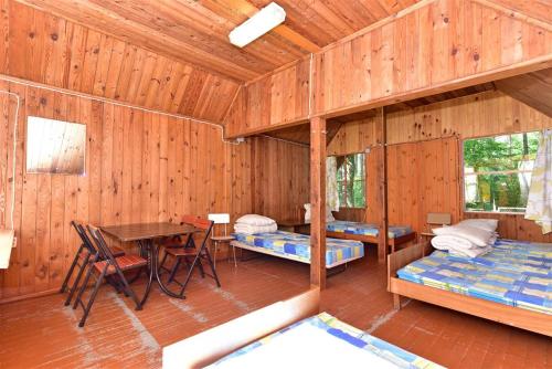 Postel nebo postele na pokoji v ubytování Camping Vaivari Jūrmala