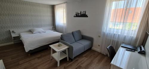 City Hotel Franziskaにあるベッド