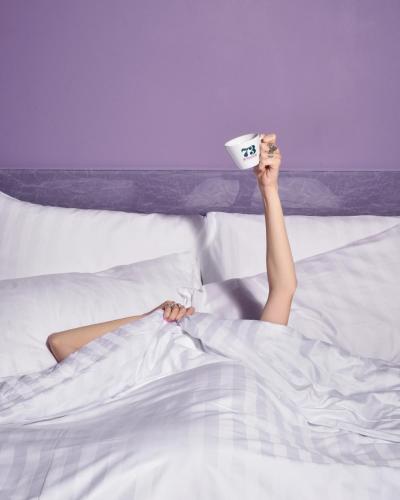 Letto o letti in una camera di 73 Boutique Hotel