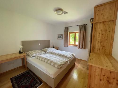 Ένα ή περισσότερα κρεβάτια σε δωμάτιο στο Klösterle Haus Egon