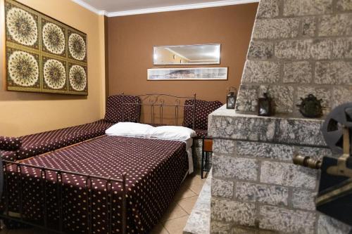 a hotel room with a couch and a table at Amfitrion in Gythio