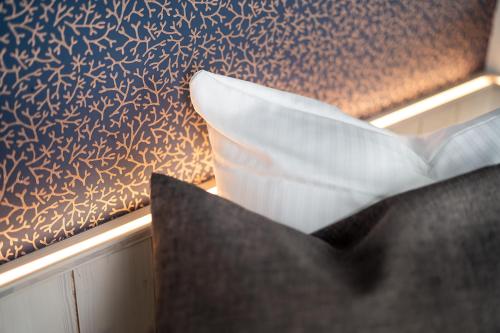 a close up of a pillow on a seat in a train at Gartenhotel Fettehenne in Erkrath