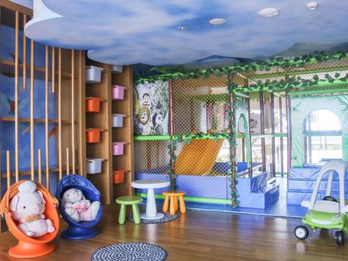 a room with many toys in it at Vasa Hotel Surabaya in Surabaya