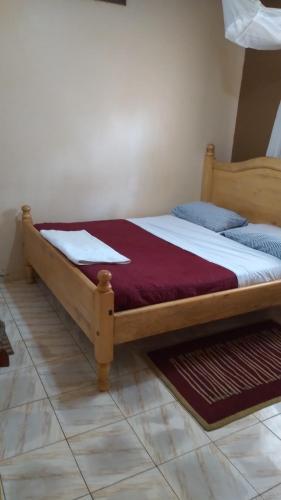 Postel nebo postele na pokoji v ubytování Sky Inn