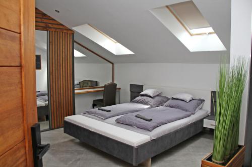 A bed or beds in a room at Player's Pool&Rooms
