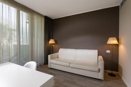 Ein Bett oder Betten in einem Zimmer der Unterkunft Hotel Maximilian