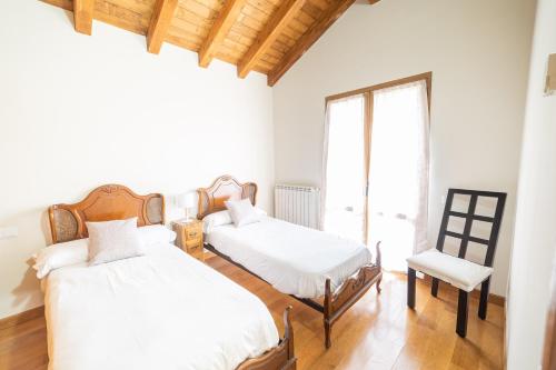 Postel nebo postele na pokoji v ubytování Casa rural Gibelea y Gibelea Txiki