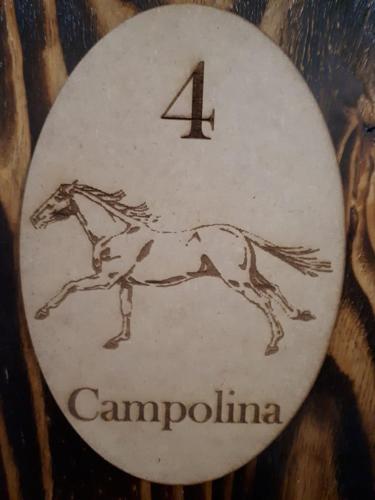 a sign with a galloping horse on it at ThabaNkwe Bushveld Inn in Thabazimbi