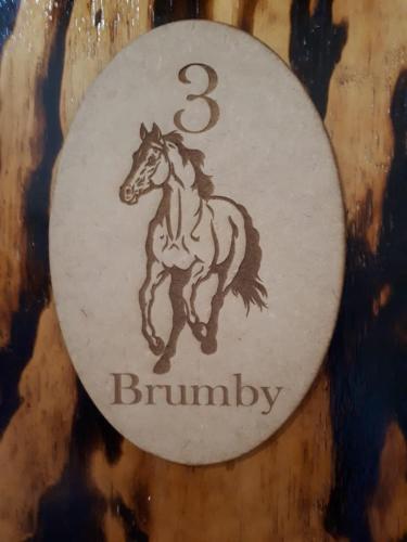 a sign with a drawing of a horse on it at ThabaNkwe Bushveld Inn in Thabazimbi