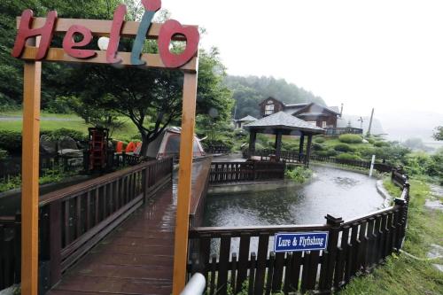 a sign for a ride at a theme park at Sisilli Pension in Pyeongchang 