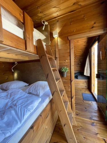 Postel nebo postele na pokoji v ubytování HYGGE Strand Camping