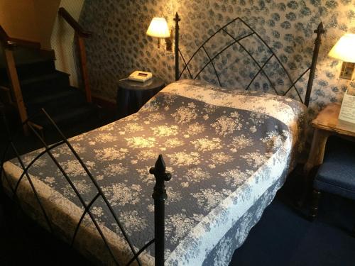 Postel nebo postele na pokoji v ubytování Cross Keys Hotel Chatteris