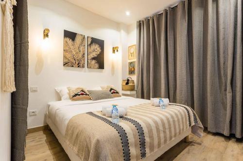 Ένα ή περισσότερα κρεβάτια σε δωμάτιο στο HSH Cosy Apartment Bidassoa Gambetta