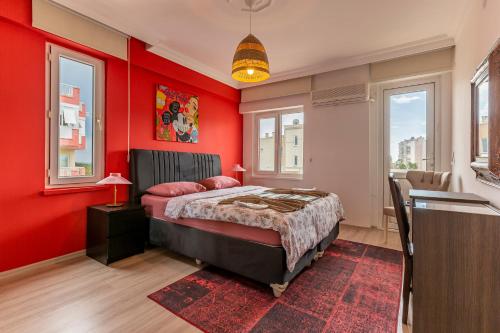 A bed or beds in a room at Melissas Suites Lara