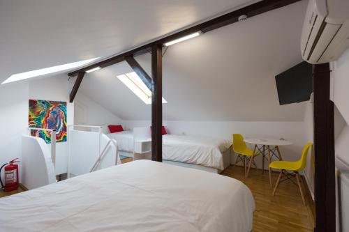 מיטה או מיטות בחדר ב-Casa Ris