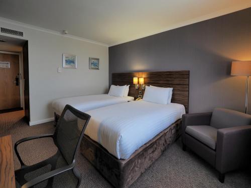 Voodi või voodid majutusasutuse Holiday Inn Liverpool City Centre, an IHG Hotel toas