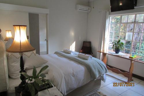 Katil atau katil-katil dalam bilik di Bancroft B&B