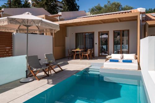 Bazén v ubytování Sivota Kipoi Design Suites nebo v jeho okolí