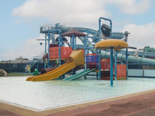 a water park with a slide in the water at 14 Fairways in Burnham on Sea