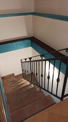 a staircase with a glass floor in a building at Original Sicily in Santa Venerina