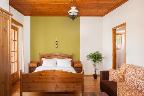 Ένα ή περισσότερα κρεβάτια σε δωμάτιο στο Erofili's Home