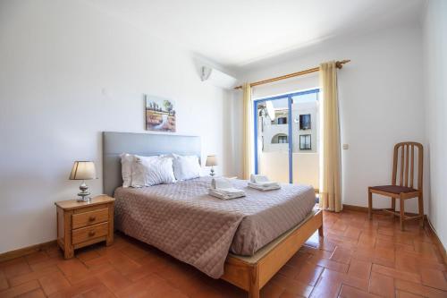 Voodi või voodid majutusasutuse Apartamento Caju by Algarve Holidays toas