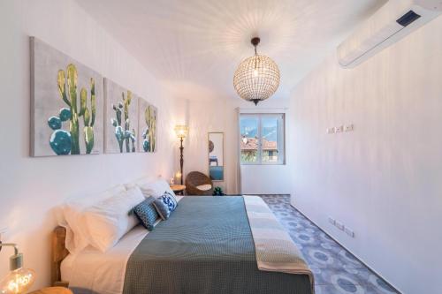 Säng eller sängar i ett rum på Casa Royale Appartamento Terra