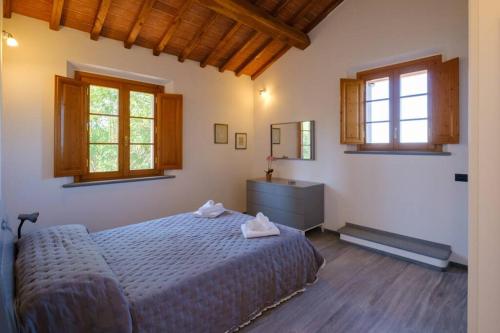 Postel nebo postele na pokoji v ubytování A Casa di Patrizia