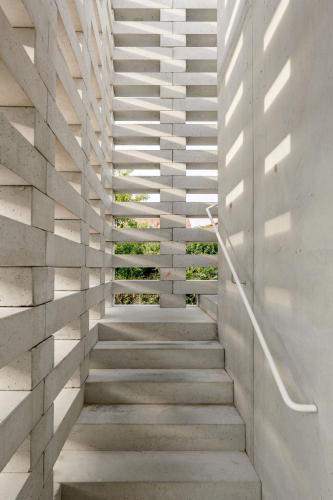 a staircase in a house with concrete steps at Hotel Bela Fisterra in Finisterre