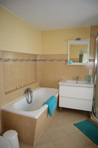Ванна кімната в Ferienwohnung Lotte