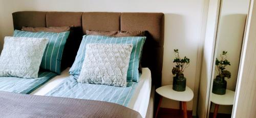 Una cama o camas en una habitación de Apartman VARENICA