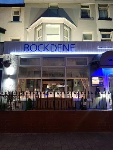 a facade of a building with a rock science sign at Rock Dene Hotel in Blackpool