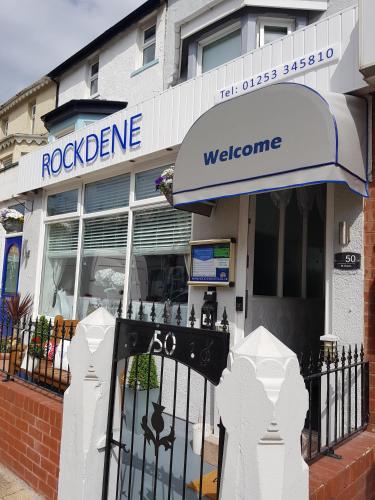 a store front of a building with a sign on it at Rock Dene Hotel in Blackpool