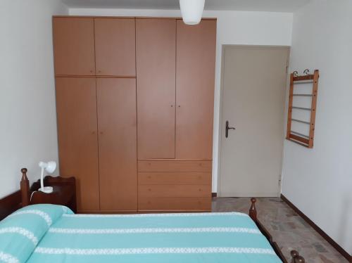 Postel nebo postele na pokoji v ubytování Bilocale a Piazza Brembana