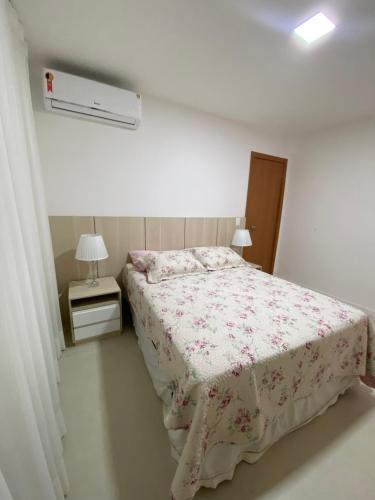 Ένα ή περισσότερα κρεβάτια σε δωμάτιο στο Residencial Ykutiba