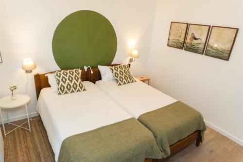 Llit o llits en una habitació de Villa Berlenga
