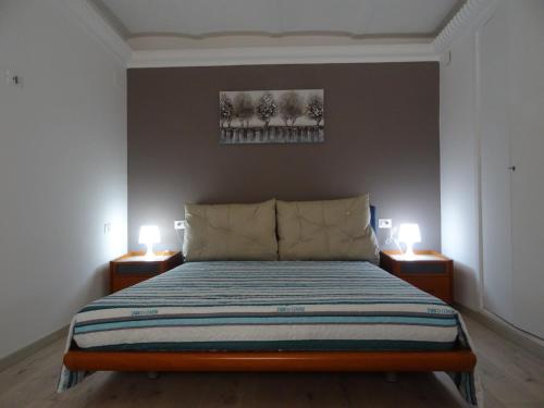 Ein Bett oder Betten in einem Zimmer der Unterkunft Casa Gattini 31