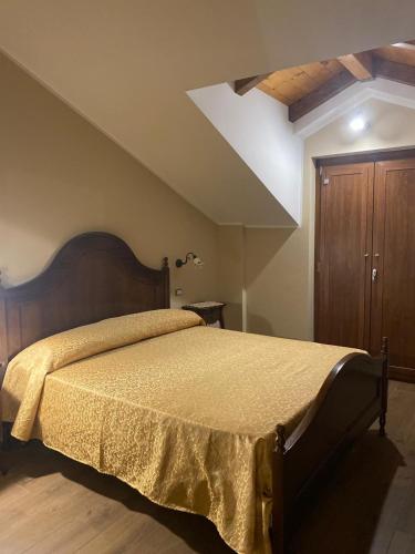 Postel nebo postele na pokoji v ubytování B&B NONNO MICHELE
